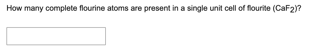 How many complete flourine atoms are present in a single unit cell of flourite (CaF2)?