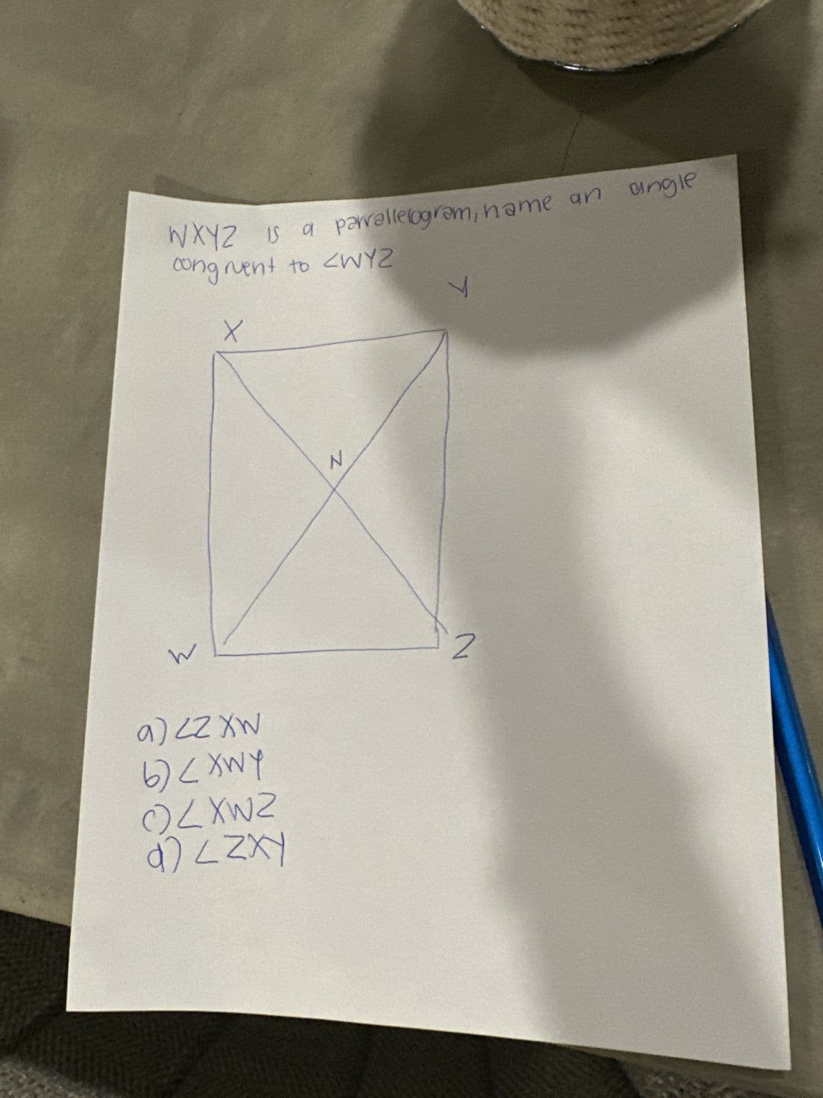 WXYZ is a parallelogram, name an
congruent to <WYZ
M
X
a) ZZ XW
LMX 7 (9
ZMX 700
d) ZZXY
N
T
2
angle