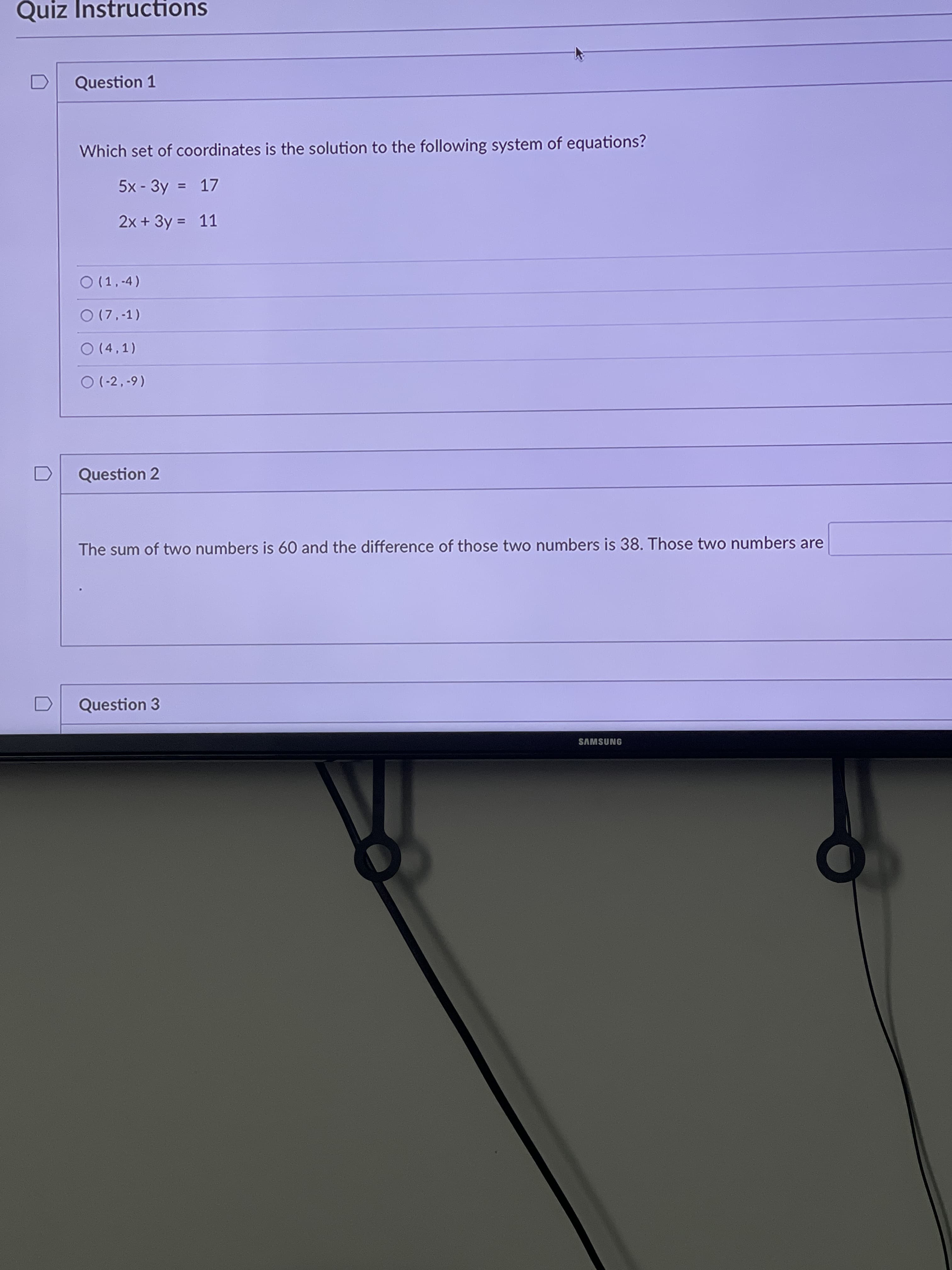 Which set of coordinates is the solution to the following system of equations?
5x - 3y = 17
2x + 3y = 11
O (1,-4)
O (7,-1)
O (4,1)
0(-2,-9)
