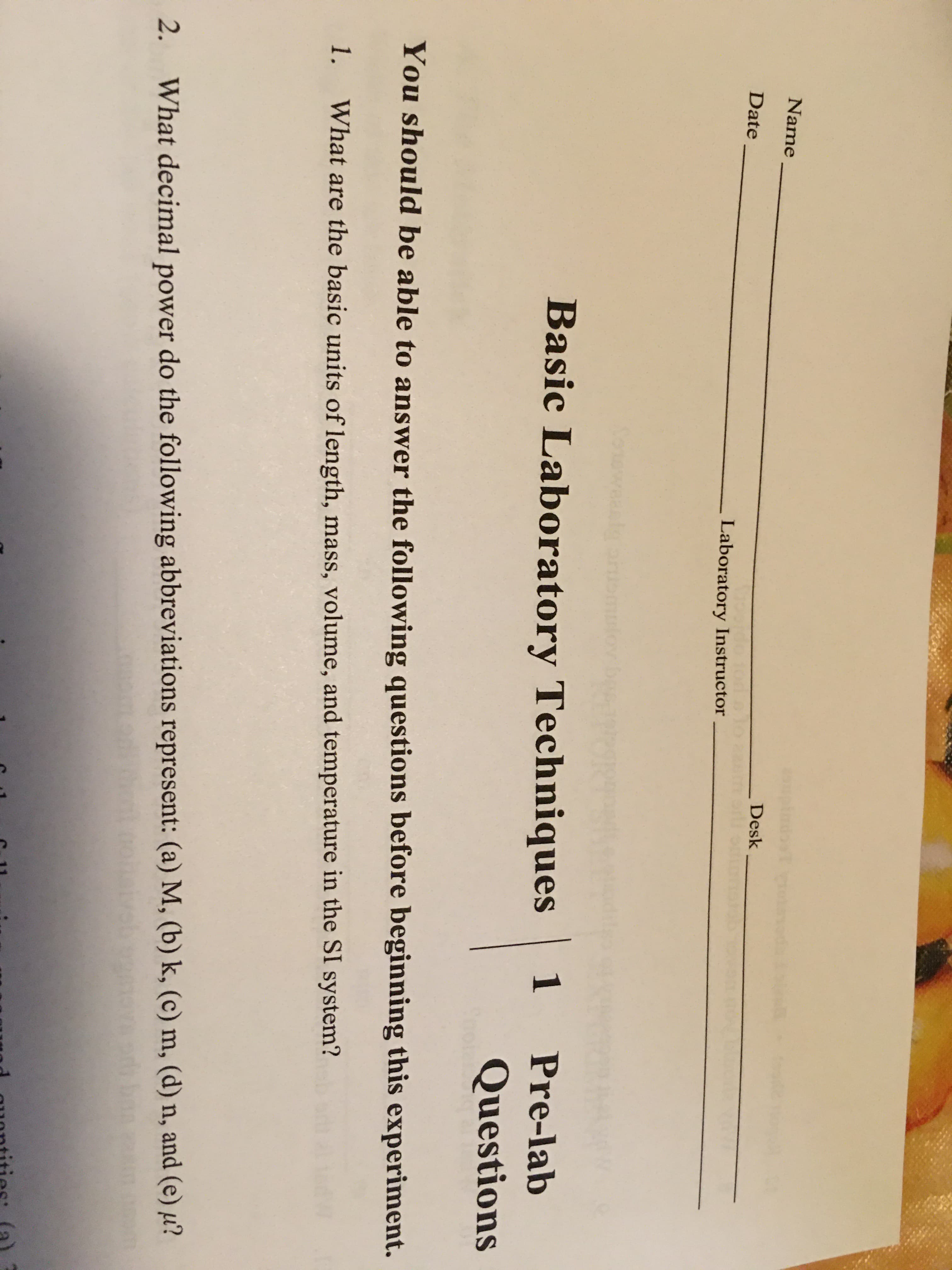 1.
What are the basic units of length, mass, volume, and temperature in the SI system?
