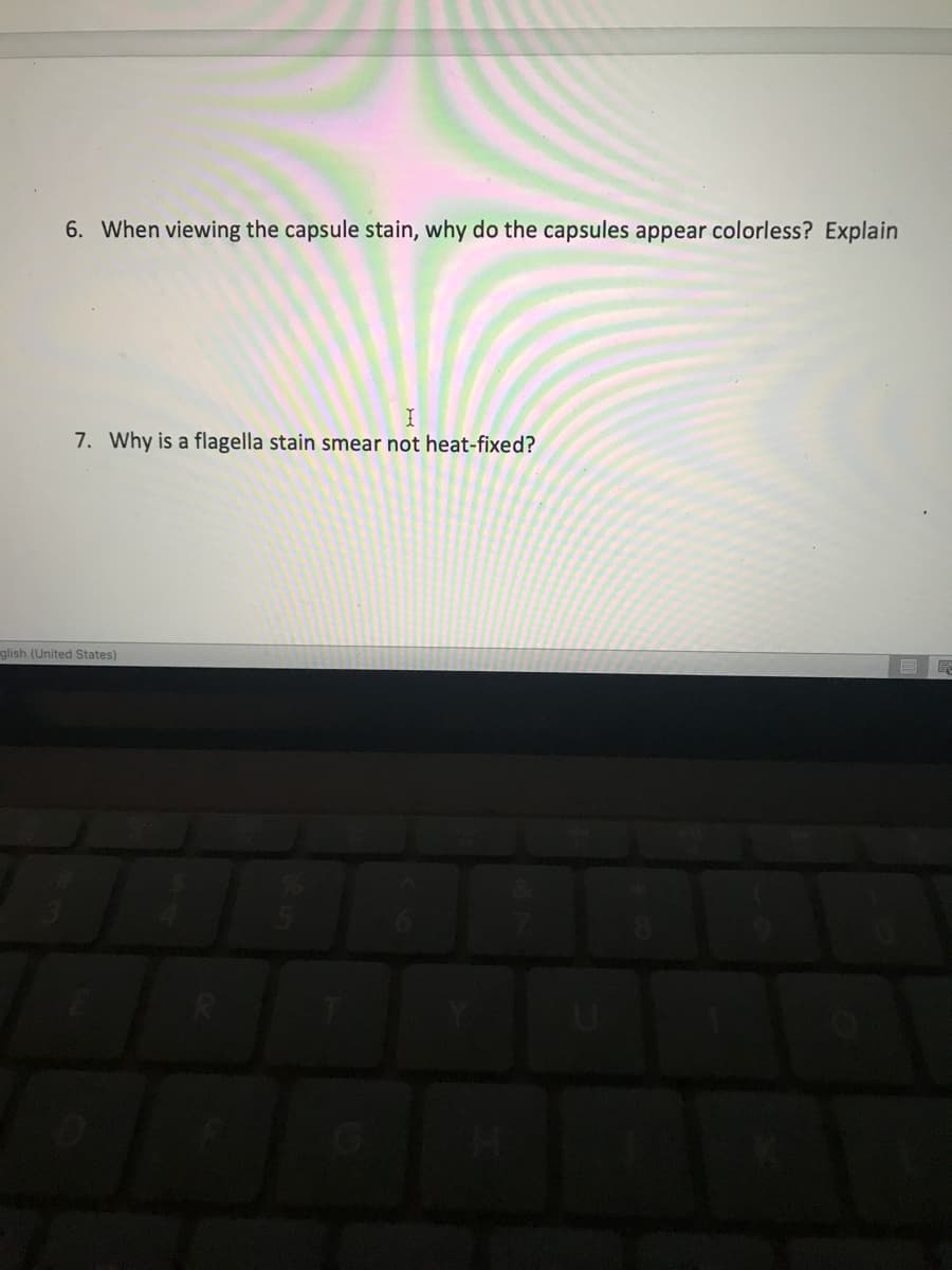 When viewing the capsule stain, why do the capsules appear colorless? Explain
