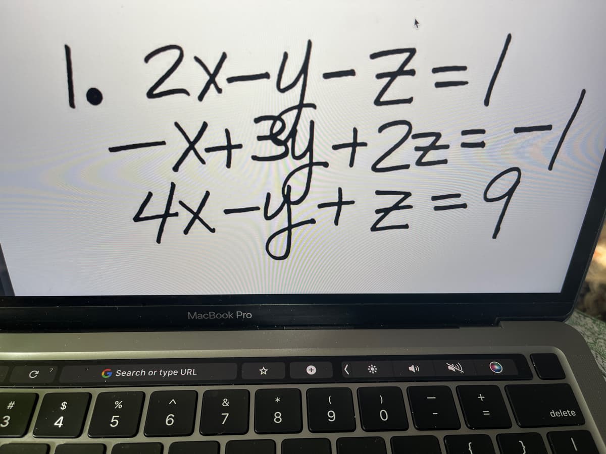 1. 2x-4-Z=/
-X+3+2z=-/
4x-8+2=9
MacBook Pro
Search or type URL
#3
$
&
*
)
delete
3
4
5
7
00
