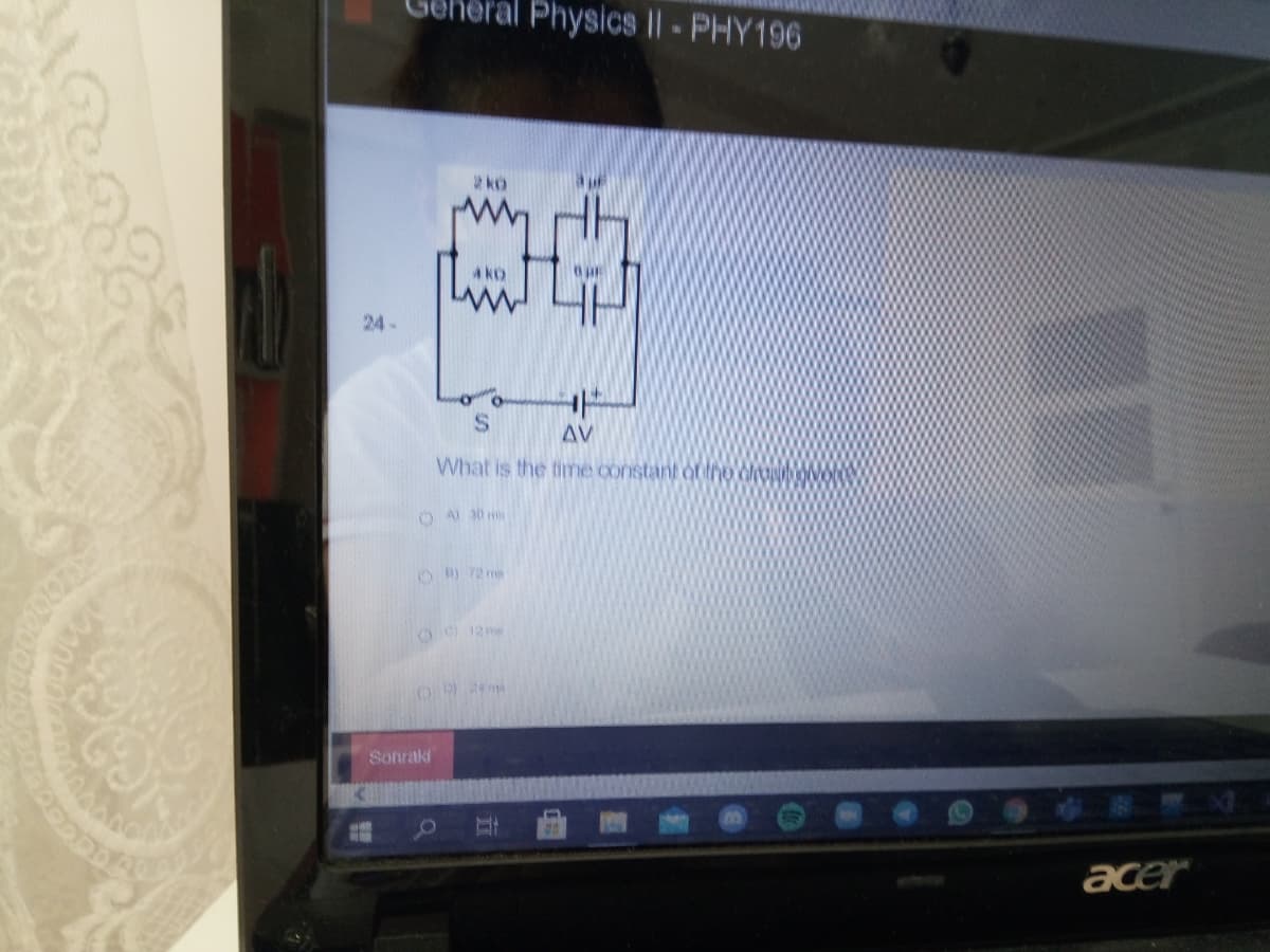 bral Physics II- PHY196
2ko
A ko
24-
S.
AV
What is the time constant of tho vONO
O A 30
0O 12 me
Sonraki
acer
