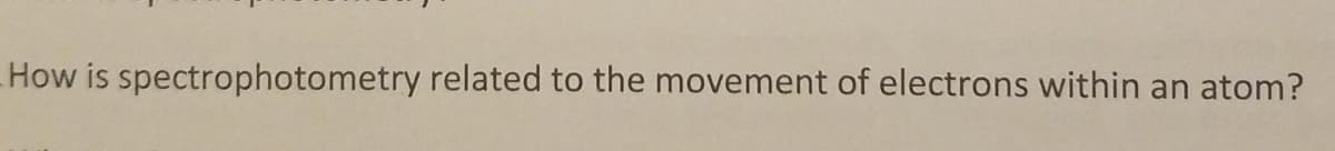 How is spectrophotometry related to the movement of electrons within an atom?
