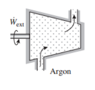 The image depicts a schematic diagram of a thermodynamic system involving Argon gas. Here is a detailed explanation of the components and processes illustrated in the diagram:

1. **System Containing Argon:**
   - The central part of the diagram shows a chamber filled with Argon gas, which is represented by the dotted region within the container.

2. **External Work (W_ext):**
   - On the left side of the chamber, there is an arrow emerging from an external source, labeled as \( \dot{W}_{ext} \). This represents the external work being done on the system.

3. **Flow of Argon:**
   - There are two arrows, one entering the chamber at the bottom left and one exiting the chamber at the top right. These arrows indicate the flow of Argon entering and leaving the system, respectively.

This diagram is likely illustrating a situation where work is being done on Argon gas, possibly in a process such as compression or expansion within a thermodynamic cycle. The understanding of such processes is essential in fields like mechanical engineering and physical sciences, where energy transformations and gas behaviors are studied extensively.