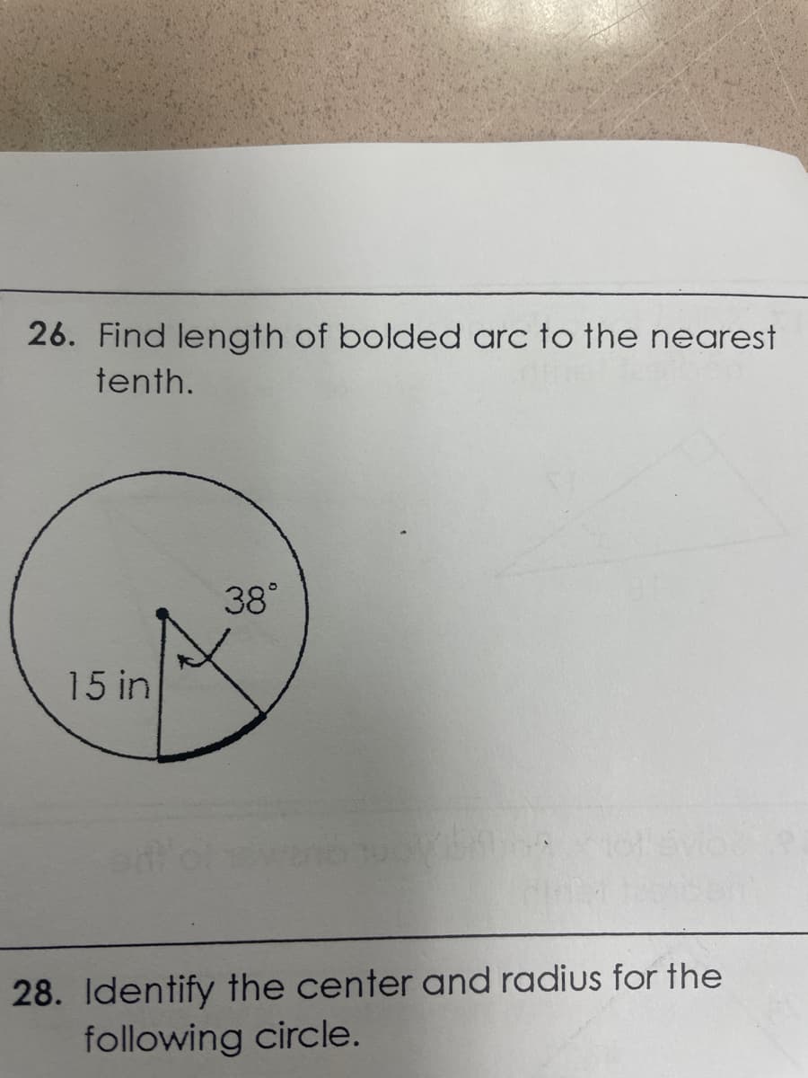 26. Find length of bolded arc to the nearest
tenth.
38°
15 in
28. Identify the center and radius for the
following circle.
