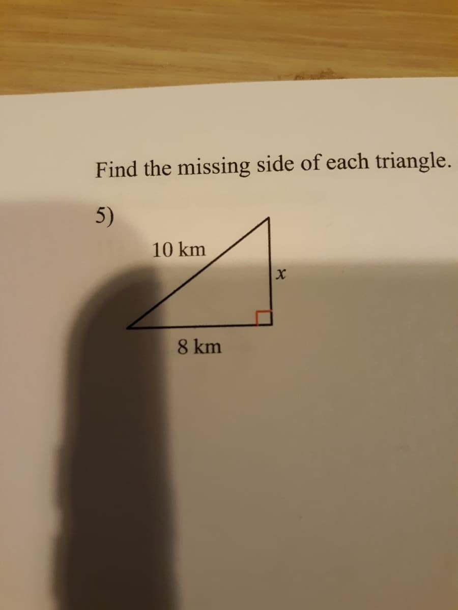 Find the missing side of each triangle.
5)
10 km
8 km
