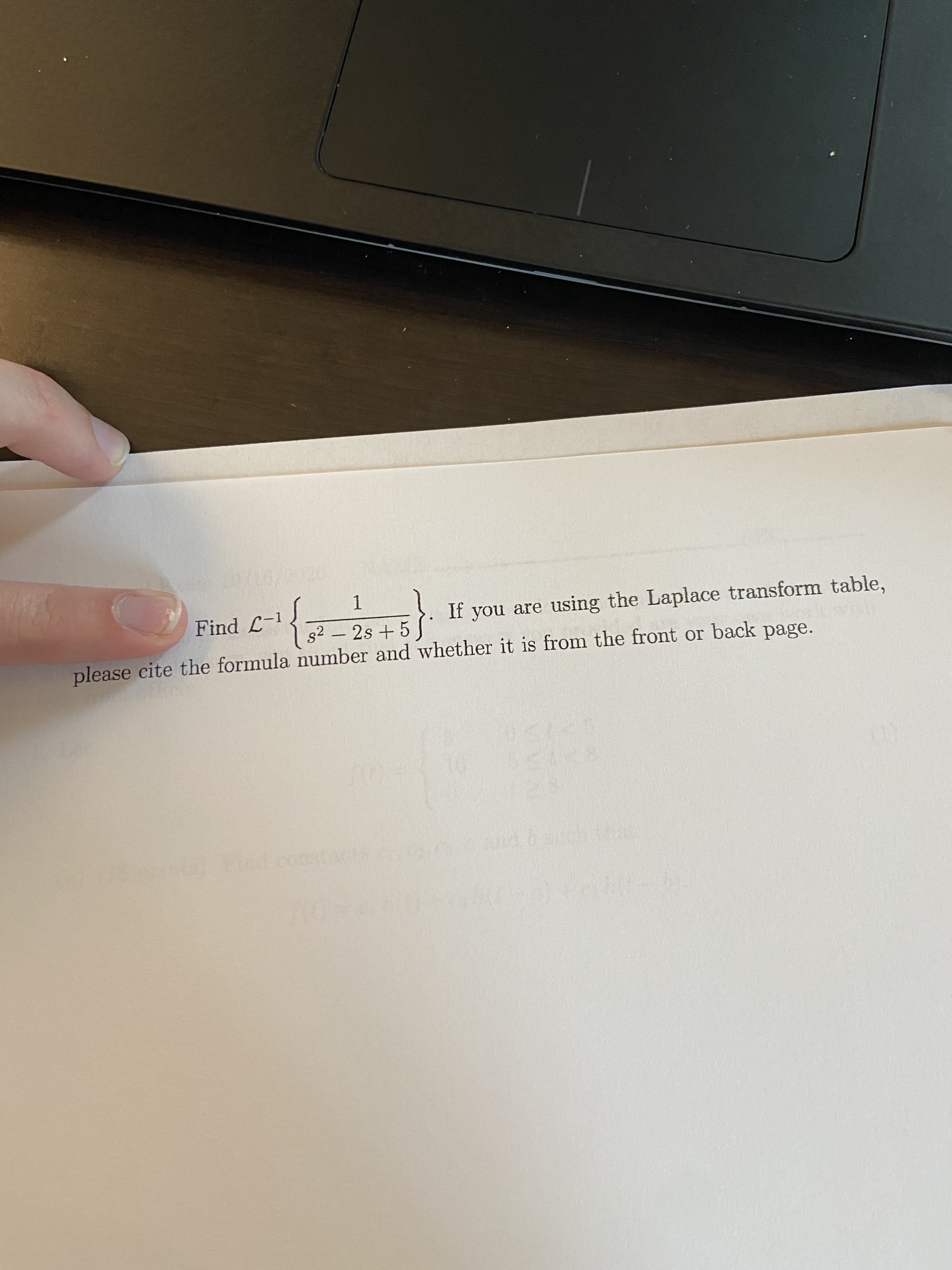 **Question:**

Find \( \mathcal{L}^{-1} \left\{ \frac{1}{s^2 - 2s + 5} \right\} \). If you are using the Laplace transform table, please cite the formula number and whether it is from the front or back page.