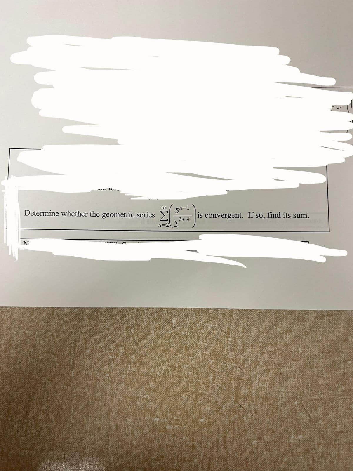 ∞ 5n-
Determine whether the geometric series Σ
n=22
3n-4
is convergent. If so, find its sum.
