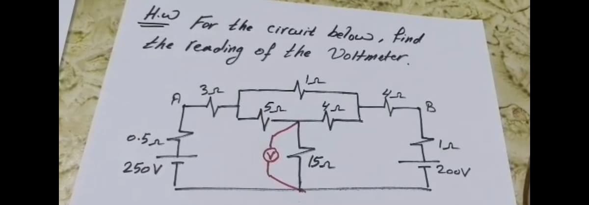 Hw For the circuit below, find
the reading of the Voltmeter.
A
In
15n
200v
250V T
