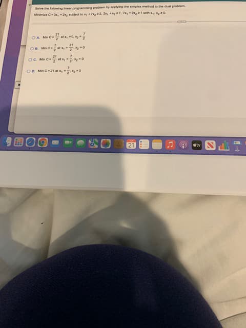 ### Linear Programming - Dual Problem Method

#### Problem Statement
Solve the following linear programming problem by applying the simplex method to the dual problem.

**Objective:** Minimize \( C = 3y_1 + 2y_2 \)

**Subject to Constraints:**

1. \( y_1 + 2y_2 \geq 7 \)
2. \( 2y_1 + 7y_2 \geq 17 \)
3. \( 5y_1 + 9y_2 \geq 21 \)

**Non-negativity Constraints:** \( y_1, y_2 \geq 0 \)

#### Multiple Choice Answers

A. \(\min C = 21 \text{ at } x_1 = \dfrac{21}{5}, x_2 = 0 \)

B. \(\min C = 17 \text{ at } x_1 = \dfrac{17}{2}, x_2 = 0 \)

C. \(\min C = 7 \text{ at } x_1 = 7, x_2 = 0 \)

D. \(\min C = 3y_1 + 2y_2 \geq 21 \text{ with } y_2 = 0 \)

#### Explanation
Here, we have a typical linear programming problem that requires minimizing a cost function subject to a set of linear inequalities and non-negativity constraints. Each answer option provides a possible minimized value of \( C \) and the corresponding values of variables \( x_1 \) and \( x_2 \) for each constraint.

In these types of problems, the simplex method can be used to determine the optimal solution by converting the problem into its dual form and then solving it using the simplex algorithm. The correct option will be the one that satisfies the given constraints and achieves the minimum value of \( C \).

### Notes:
- **Simplex Method:** A powerful technique used in linear programming for finding the optimal solution to an optimization problem.
- **Dual Problem:** A linear programming problem derived from another linear programming problem (the primal problem), which helps in finding the solution more efficiently.
- **Constraints:** These are the conditions that the solution must satisfy.

The transcription provided incorporates the problem statement, constraints, multiple-choice answers, and an explanation, suitable for an educational website focusing on understanding and solving linear programming problems using the