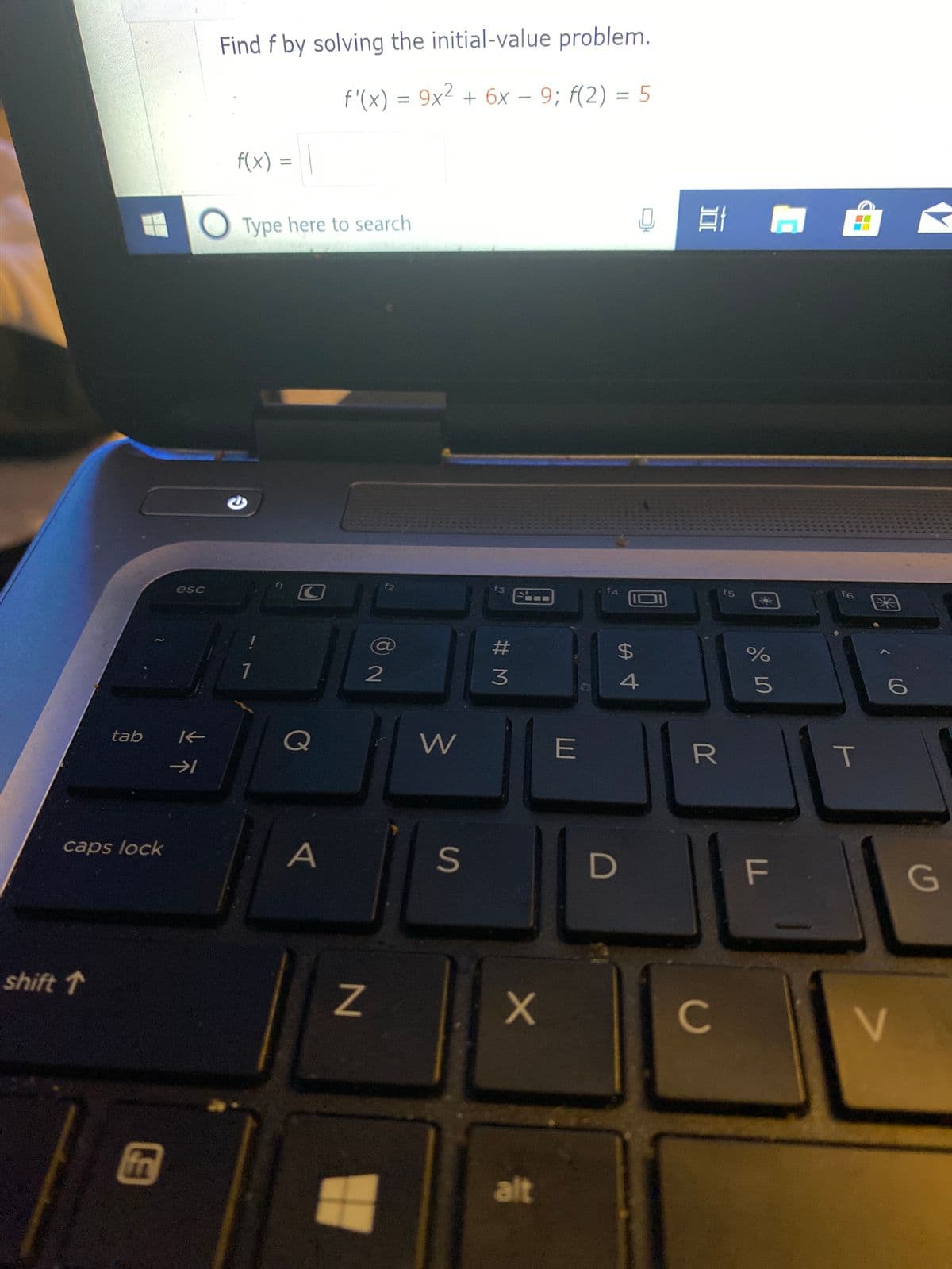 Find f by solving the initial-value problem.
f'(x) = 9x² + 6x – 9; f(2) = 5
f(x) =
%3D
Type here to search
esc
f2
f3
fs
f6
$4
3
tab
Q
W
E
T
caps lock
A
D
F
G
shift 1
C
in
alt
