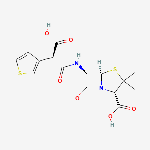 This image depicts the molecular structure of a chemical compound, represented in a two-dimensional format.

- **Structural Formula**: The image is a detailed structural formula of a molecule. The various atoms are depicted as follows: carbon (C) atoms are represented by the vertices of the lines, hydrogen (H) atoms connected to carbon atoms are usually omitted for simplicity and understood to be there, oxygen (O) atoms are shown in red, nitrogen (N) atoms in blue, and sulfur (S) atoms in yellow. 

- **Functional Groups**: Several functional groups are present in this structure:
  - A **carboxylic acid group** (-COOH) is attached to the large ring carbon structure.
  - There is an **amide group** (R-CO-NH-R') connected to a nitrogen atom (blue).
  - The presence of **thioether** or **thiol groups** (indicated by sulfur in yellow).
  - A **5-membered ring** containing two sulfur atoms and an oxygen.

- **Stereochemistry**: The depiction includes stereochemistry, showing three dimensions with certain bonds represented as:
  - Solid wedges (indicating the bond comes out of the plane toward the observer).
  - Dashed wedges (indicating the bond goes behind the plane away from the observer).

This structure can be used to study the molecule's chemical properties, reactivity, and role in biological systems. It is essential for students and researchers in fields such as chemistry, biochemistry, and pharmacology.