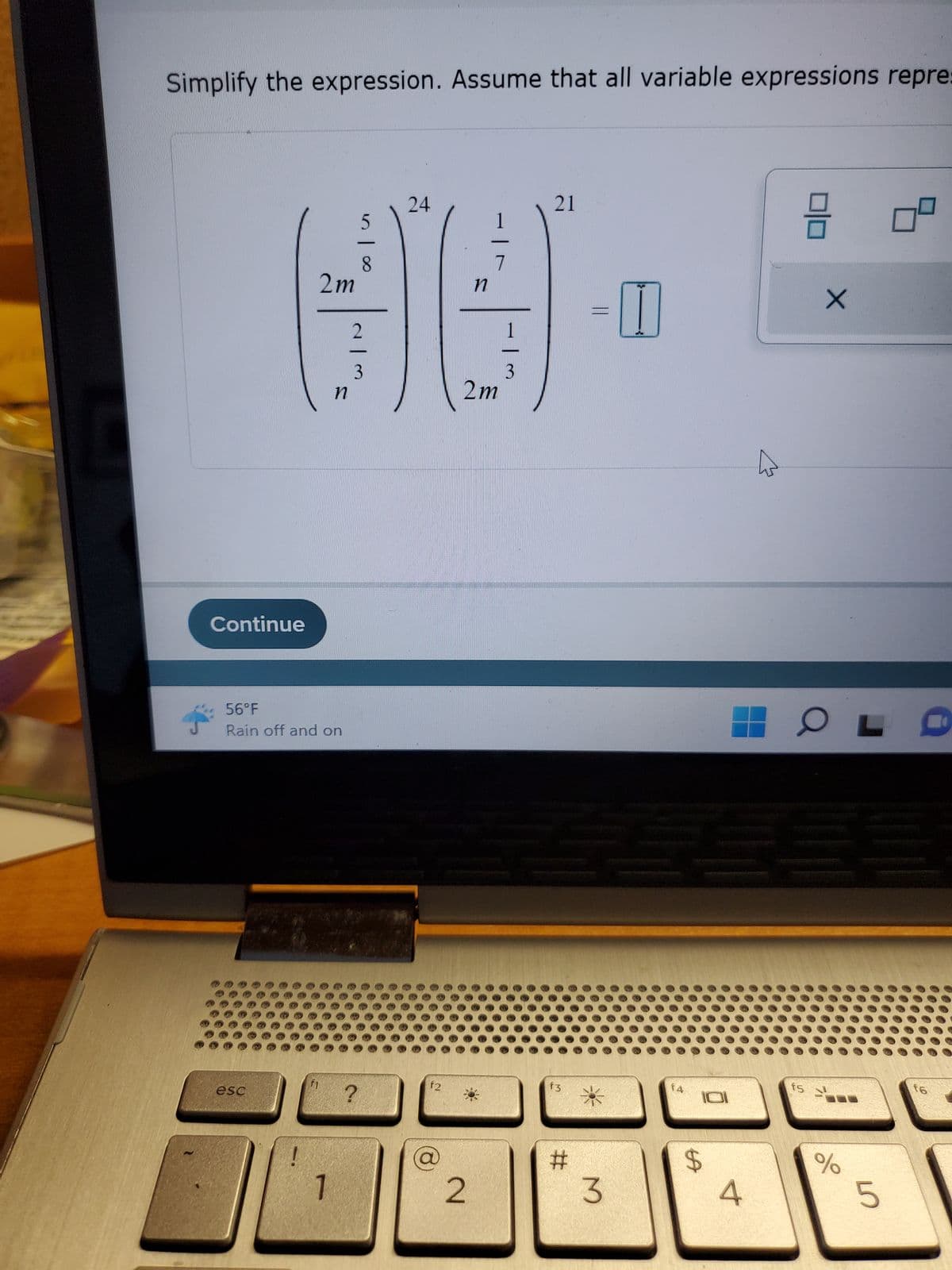 Simplify the expression. Assume that all variable expressions repre:
Continue
esc
2m
56°F
Rain off and on
!
f1
n
1
n100
2
?
24
f2
17
2m
2
1
3
21
f3
#
||
3
14
$
101
4
믐
f5
X
%
L
5
9