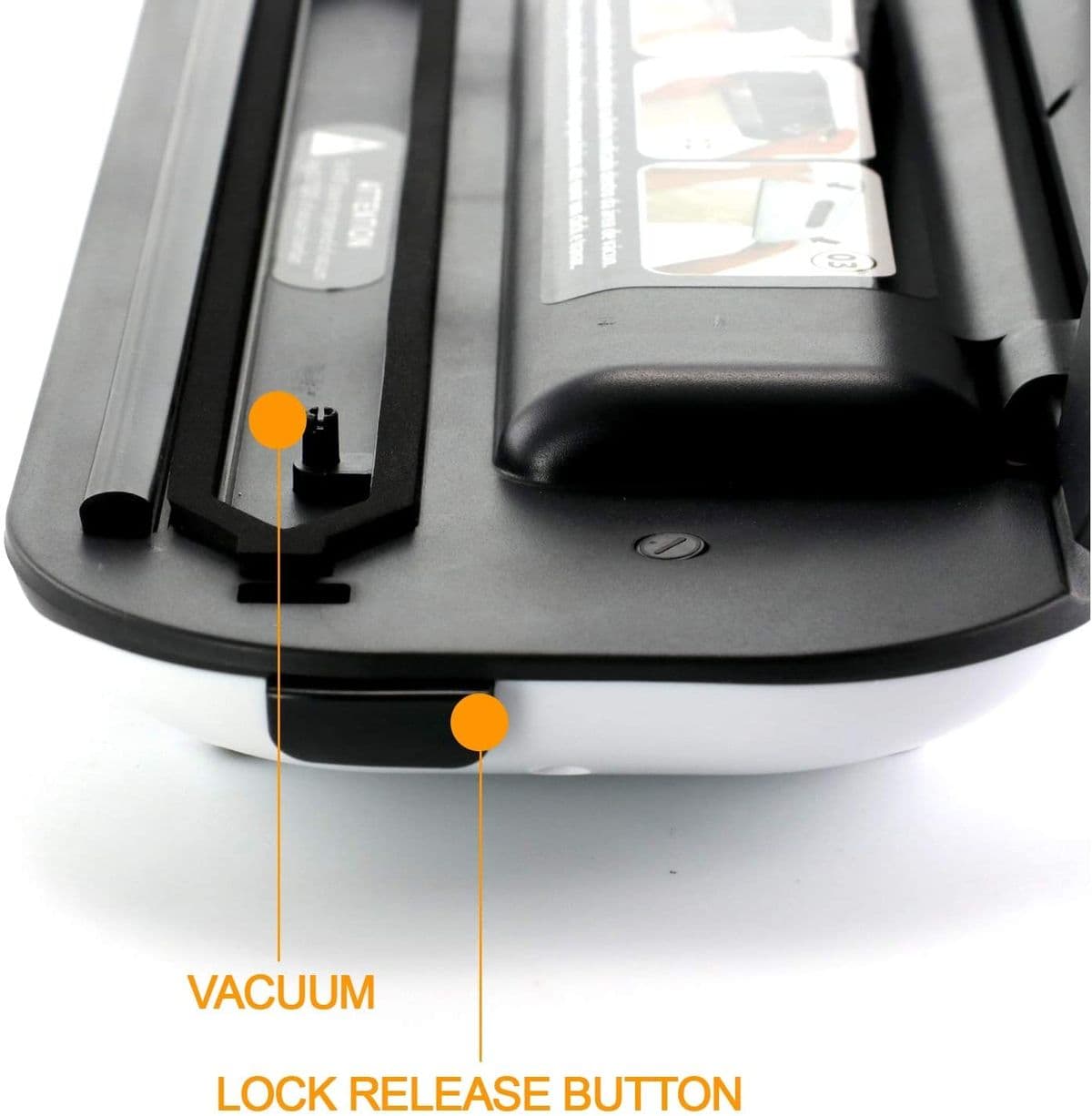 VACUUM
LOCK RELEASE BUTTON
TENTION
