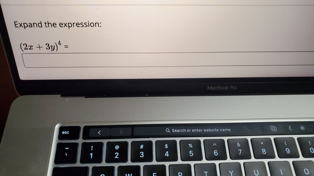 Expand the expression:
4
(2x + 3y)* =
%3D
MacBook Pro
Q Search or enter website name
esc
@
2$
&
3
4
5
7
8
1
T.
Y
U
* 00
2
