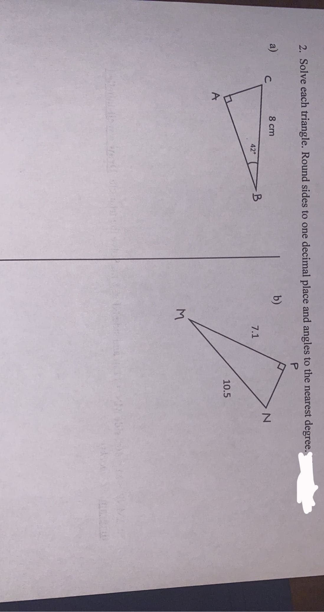 2. Solve each triangle. Round sides to one decimal place and angles to the nearest degree.
P.
a)
b)
8 cm
C
7.1
42°
10.5
A
M.
