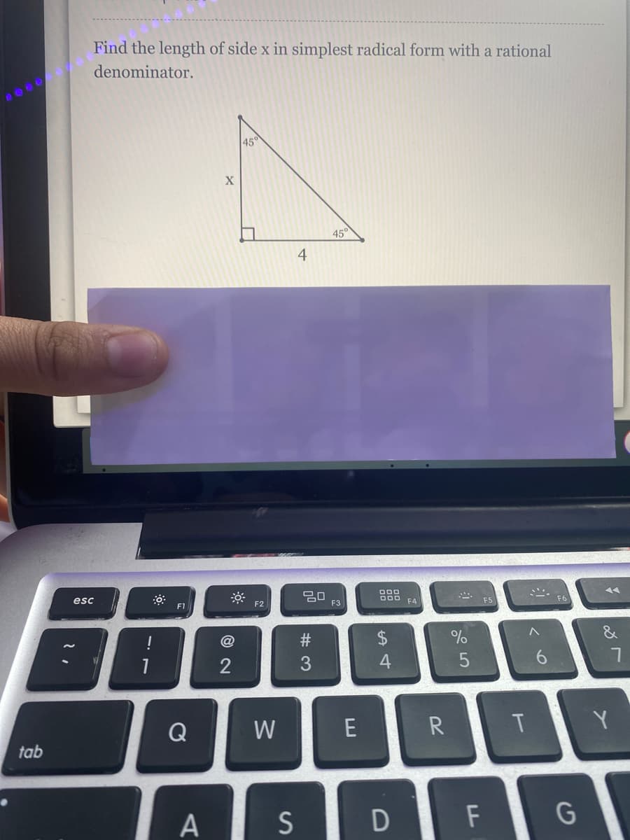 Find the length of side x in simplest radical form with a rational
denominator.
45°
45°
4
DO0 F4
esc
F3
F5
F1
F2
!
24
%
4
6.
Q
W
E
R
Y.
tab
A
S
D
%# 3
