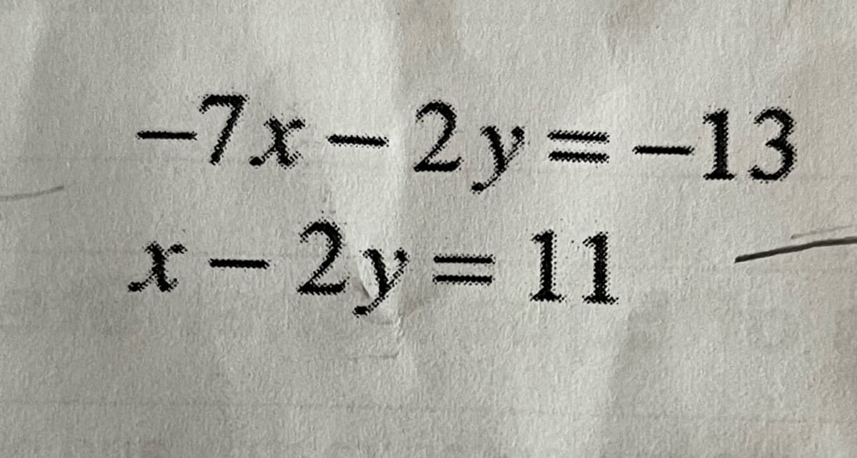 -7x - 2 y =-13
x-2y = 11
