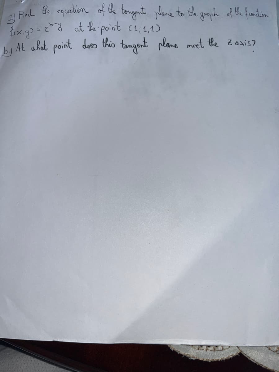 1) Find the equation of the tongent plane to the graph of the function
fix,y)=ety at the point (1,1,1)
by At what point does this tangent plane meet the Z axis?