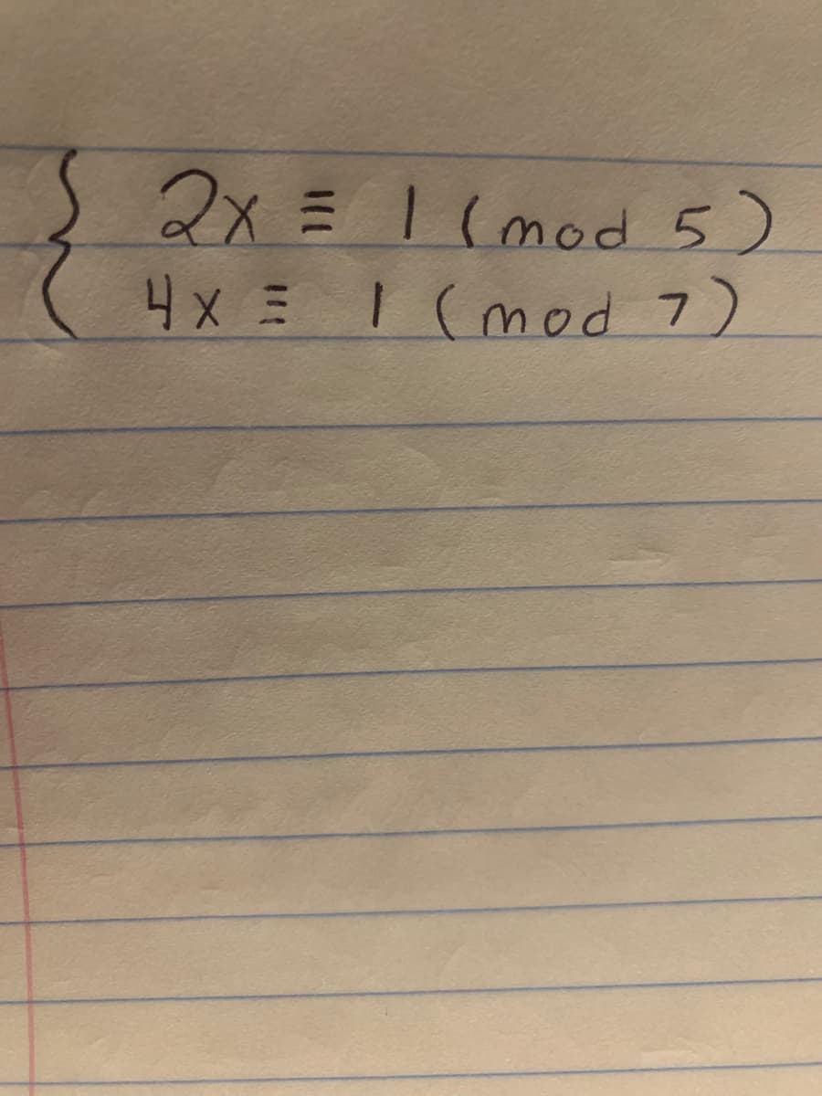 The image displays a system of congruences, which can be expressed as follows:

1. \(2x \equiv 1 \pmod{5}\)
2. \(4x \equiv 1 \pmod{7}\)

This system involves two separate modular arithmetic equations. 

The first equation, \(2x \equiv 1 \pmod{5}\), seeks an integer \(x\) such that when \(2x\) is divided by 5, the remainder is 1.

The second equation, \(4x \equiv 1 \pmod{7}\), seeks an integer \(x\) such that when \(4x\) is divided by 7, the remainder is 1.

Such systems can often be solved using techniques from number theory, such as the Chinese Remainder Theorem or the method of successive substitutions.