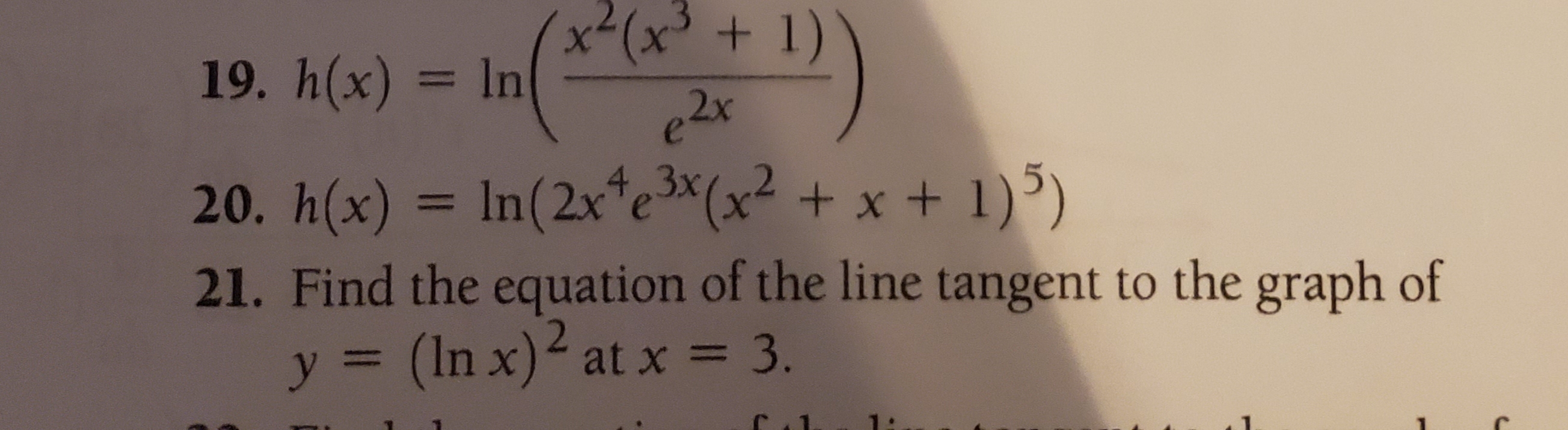 x2(x3 1)
In
19. h(x)
e2r
20. h(x) In(2x4e(x x + 1)5)
21. Find the equation of the line tangent to the graph of
y = (In x) atx = 3.
1
