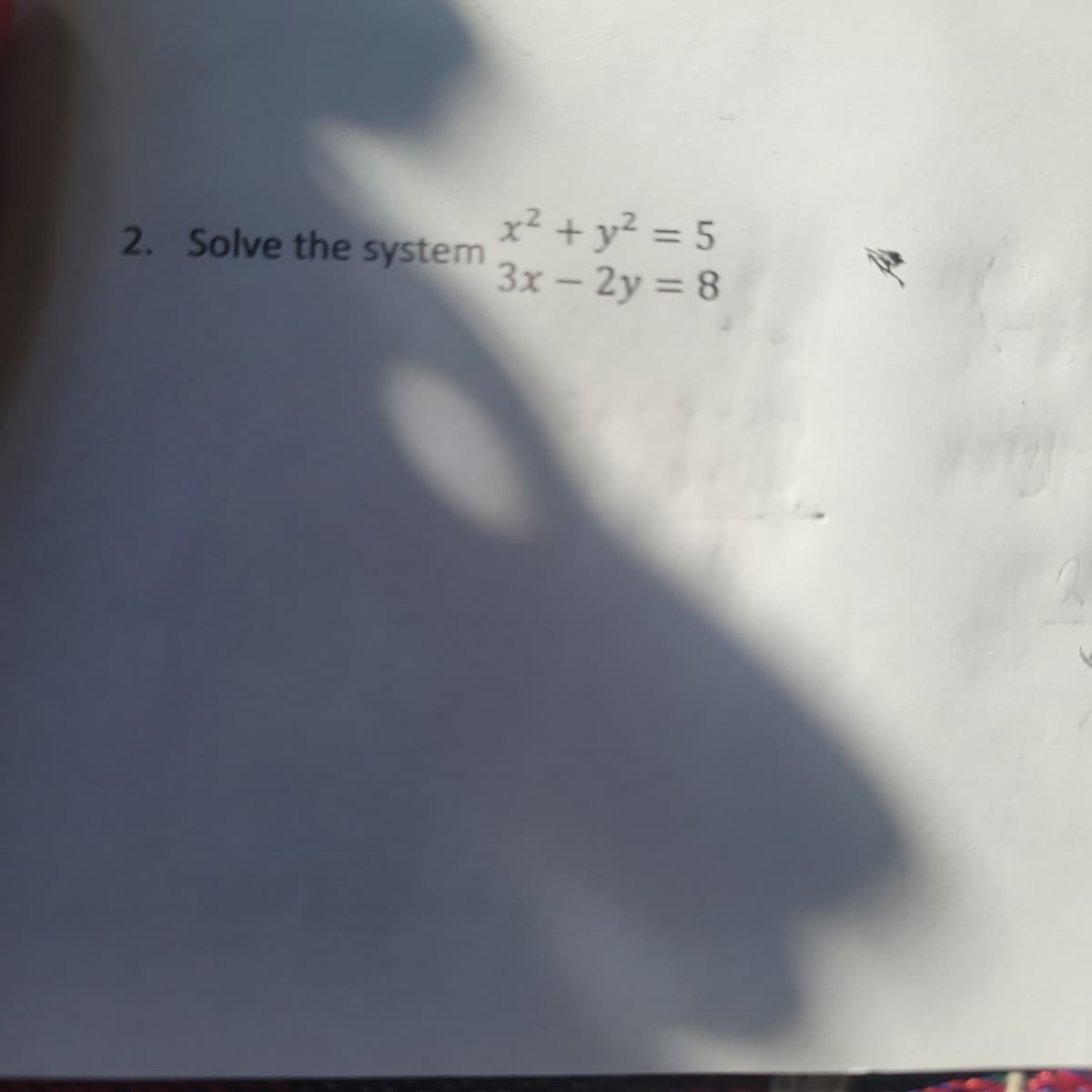 2. Solve the system
x² + y² = 5
3x - 2y = 8