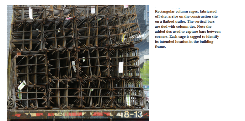 Rectangular column cages, fabricated
off-site, arrive on the construction site
on a flatbed trailer. The vertical bars
are tied with column ties. Note the
added ties used to capture bars between
corners. Each cage is tagged to identify
its intended location in the building
frame.
48-13
