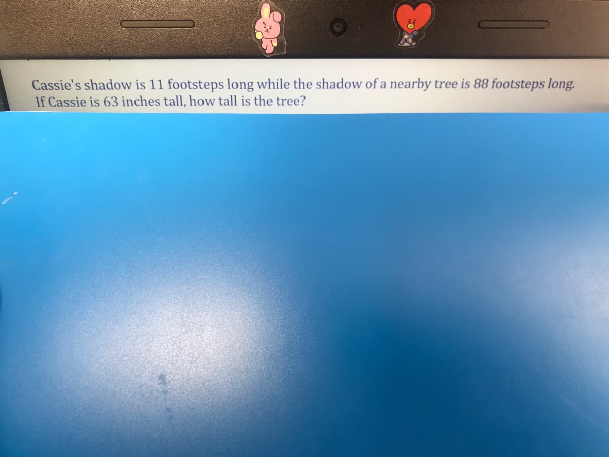 Cassie's shadow is 11 footsteps long while the shadow of a nearby tree is 88 footsteps long.
If Cassie is 63 inches tall, how tall is the tree?
