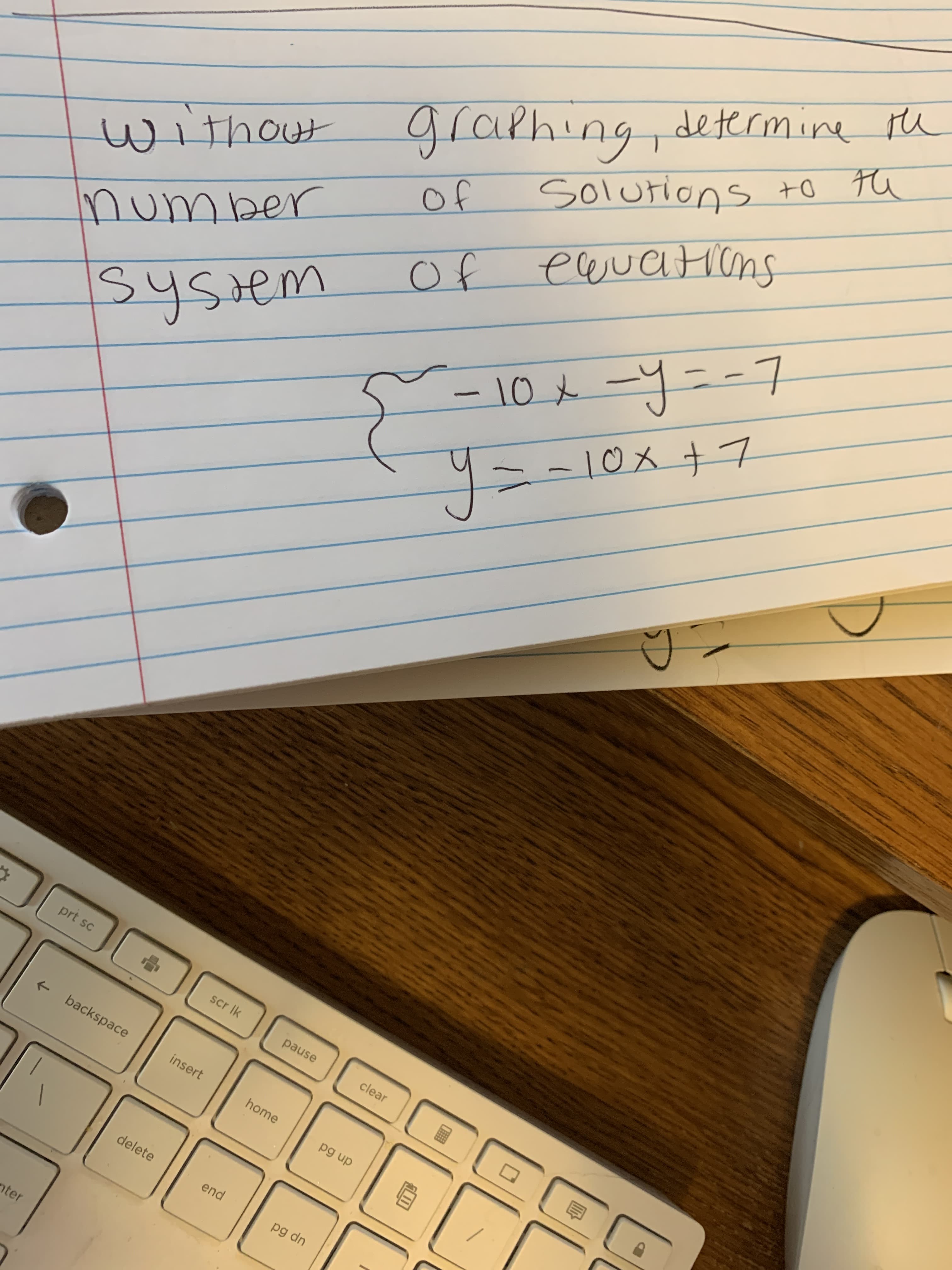 without
graphing, determine te
number
of
Solutions +o ta
system
Of
eauations
– 10x -y=-7
4ニ-10メ +7
