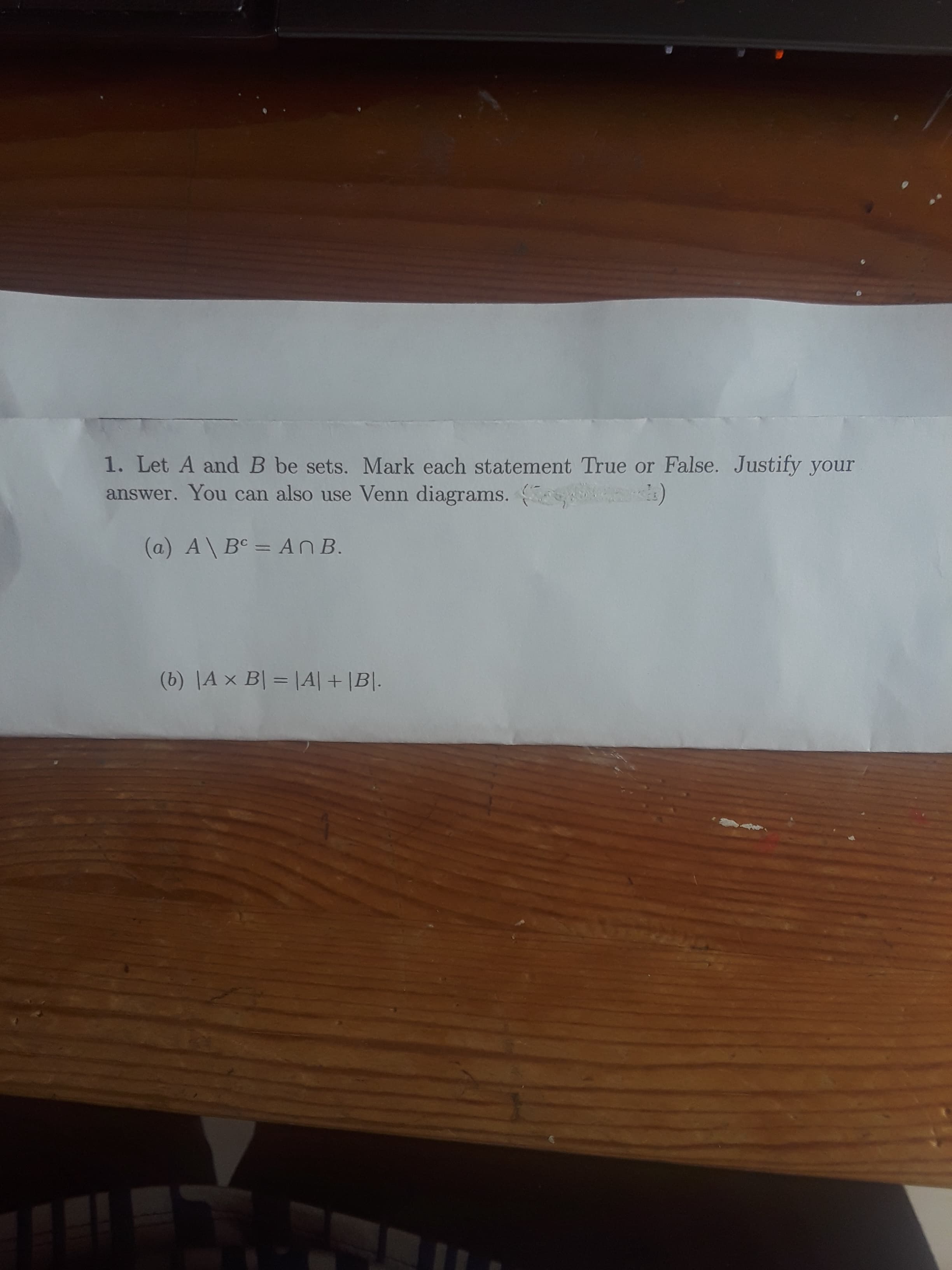 .Let A and B be sets. Mark each statement True or False. Justify your
nswer. You can also use Venn diagrams.
(a) A\ B° = A n B.
%3D
(b) |A × B| = |A|+|B|.
%3D

