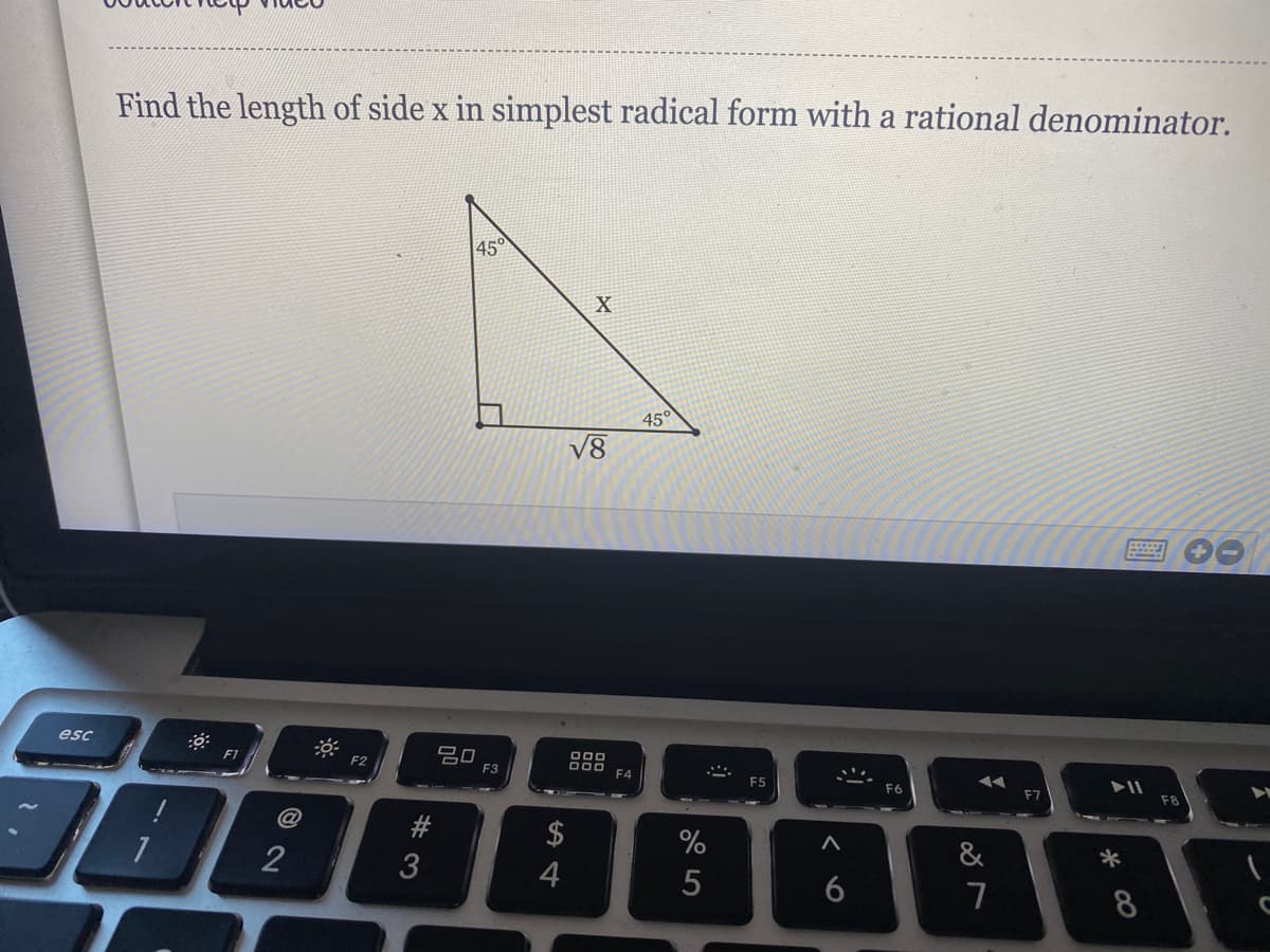 Find the length of side x in simplest radical form with a rational denominator.
45°
45°
V8
esc
F1
吕口
F2
F4
F5
F6
F7
F8
%
&
*
2
3
4
6
7
8
