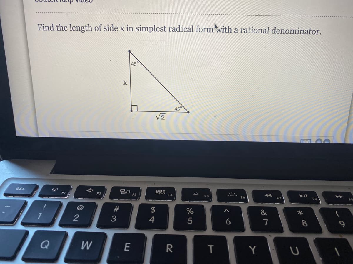 Find the length of side x in simplest radical form with a rational denominator.
45°
45
V2
吕0
F3
esc
F1
F2
F4
F5
F6
@
$
%
&
2
5
6
8
Q
E
R
T
Y
