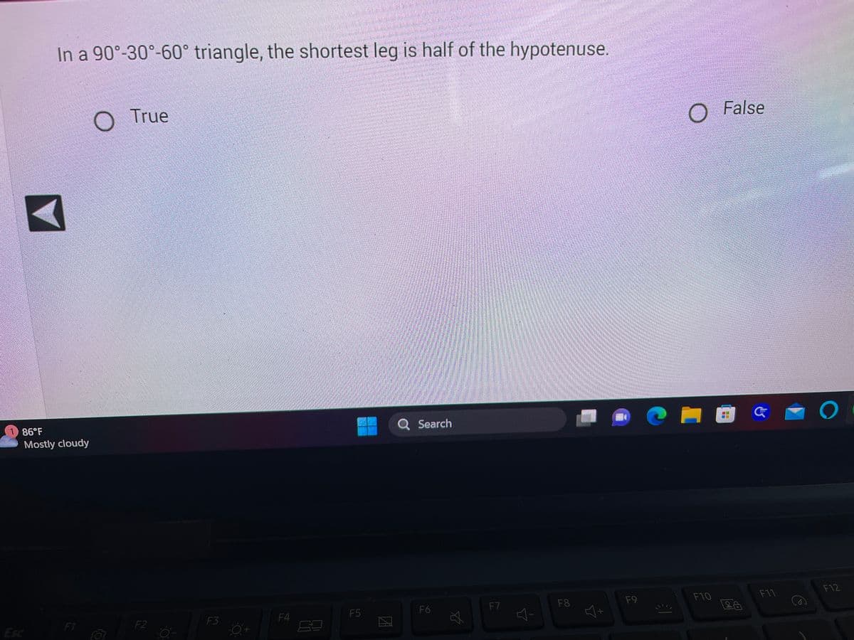 **Title: Understanding 90°-30°-60° Triangles**

**Content:**

In a 90°-30°-60° triangle, the shortest leg is half of the hypotenuse.

- O  True
- O  False

[Interactive Component: Users can select either "True" or "False" as their answer option.]

**Explanation:**
A 90°-30°-60° triangle is a special type of right triangle. In this type of triangle:
- The side opposite the 30° angle is the shortest side and is equal to half the length of the hypotenuse.
- The side opposite the 60° angle is √3/2 times the length of the hypotenuse.

**Example Diagram:**
Unfortunately, we are unable to display diagrams here, but imagine a right triangle where:
- The hypotenuse (c) is the side opposite the right angle.
- The shorter leg (a), opposite the 30° angle, is half the hypotenuse (a = c/2).
- The longer leg (b), opposite the 60° angle, is the hypotenuse multiplied by the square root of 3 divided by 2 (b = (√3/2)c).

**Additional Note:**
For practical learning and visualization, we recommend drawing the triangle and labeling the angles and sides according to the information provided to better understand the relationship between the sides and angles in a 90°-30°-60° triangle.