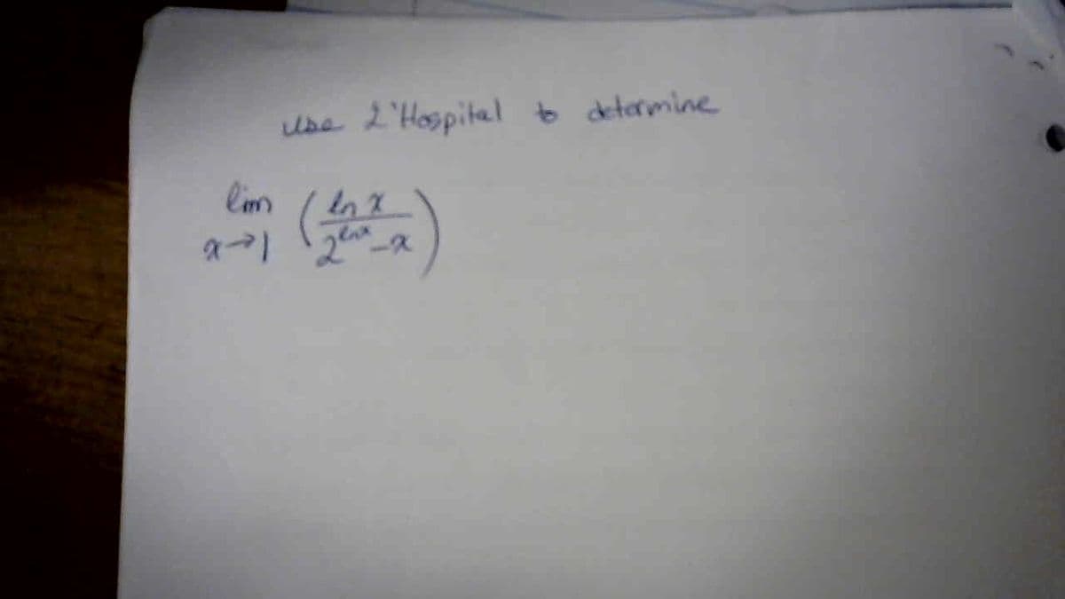 Use 2'Hospital to determine
lim
In X
