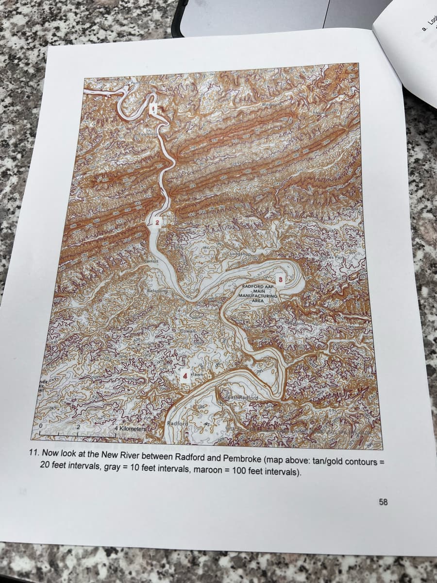 Kilometers
RADFORD AAR
MAIN
MANUFACTURING
CAREA
CasteRadford
11. Now look at the New River between Radford and Pembroke (map above: tan/gold contours =
20 feet intervals, gray = 10 feet intervals, maroon = 100 feet intervals).
58
a. Lool